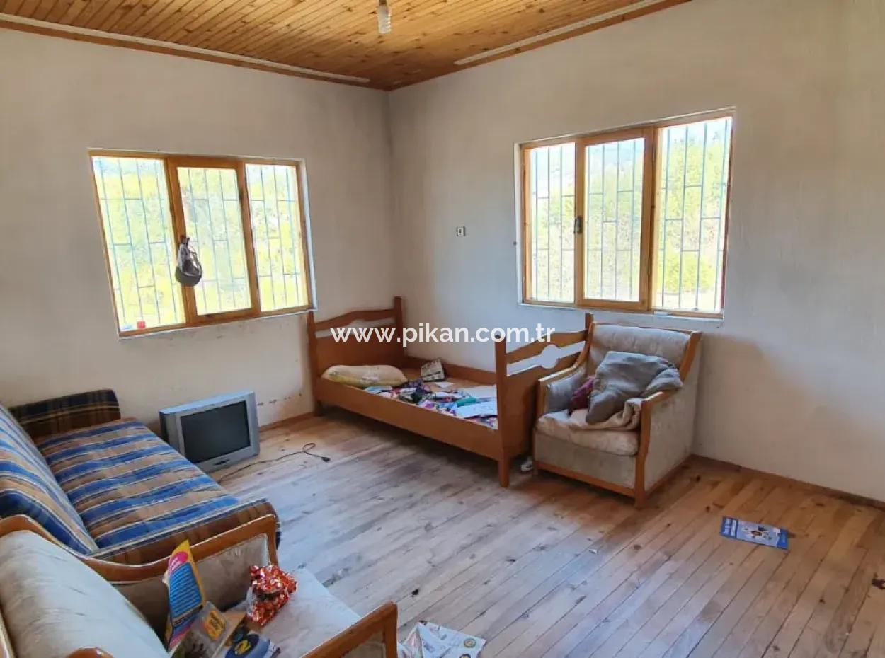 Denizli Çameli Ericekte İçinde 2 Adet Ev Bulunan Arazi Satılık