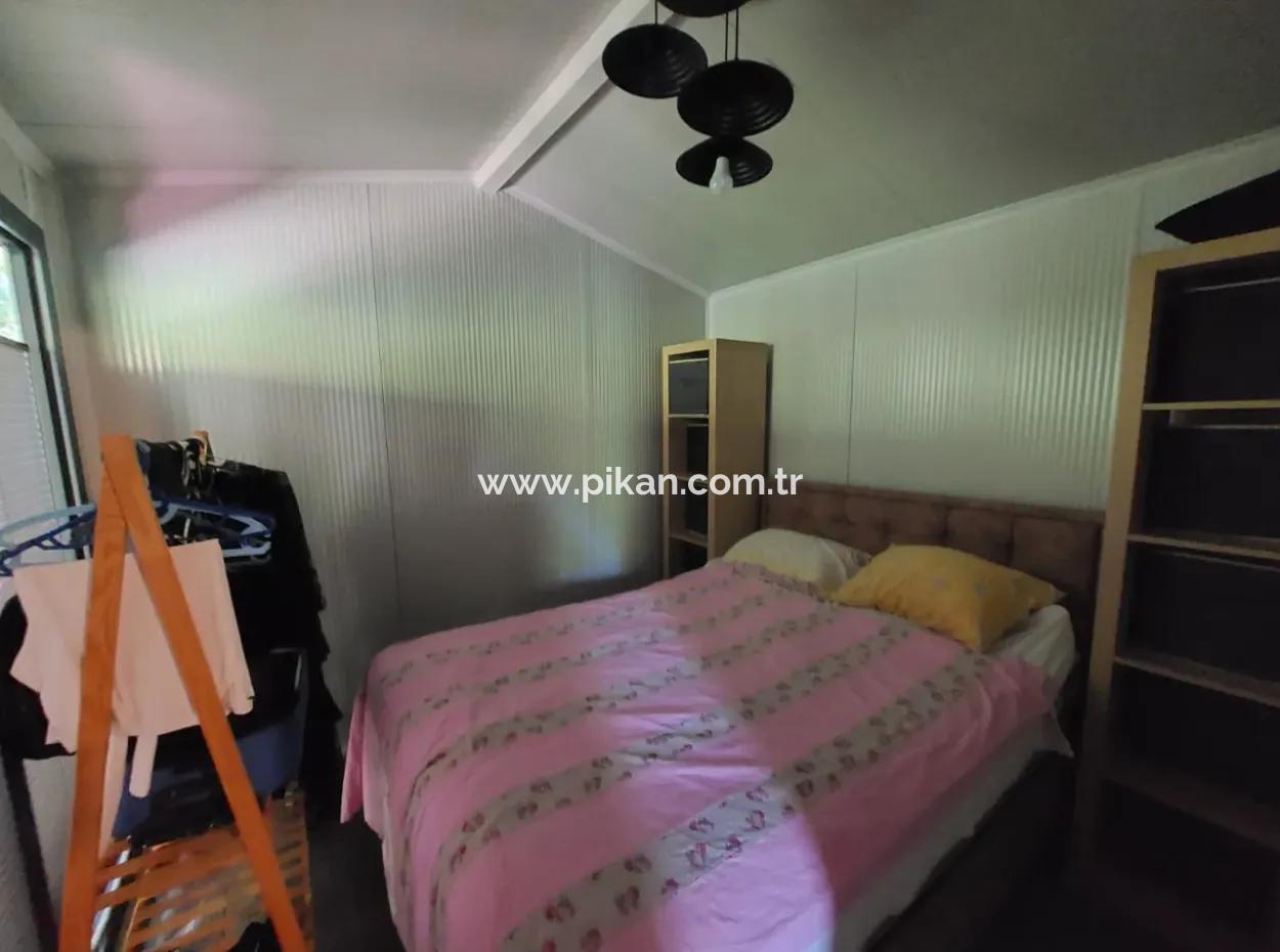 Ortaca Okçular’da 21 M² Eşyalı 1+1 Konteyner Ev – Yıllık Kiralık