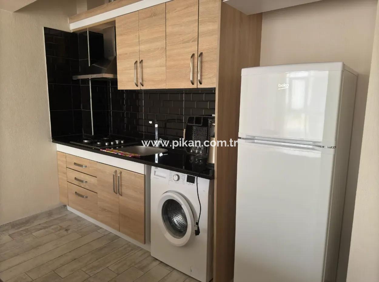 Ortaca Çarşı Merkezde Eşyalı 1+1 Geniş Daire Kiralık.