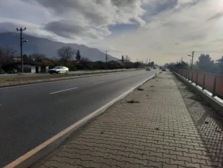 Köyceğiz Toparlar’da Ana Yola Cepheli 2.800 M² Ticari/Konut İmarlı Arsa Satılık