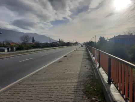 Köyceğiz Toparlar’da Ana Yola Cepheli 2.800 M² Ticari/Konut İmarlı Arsa Satılık