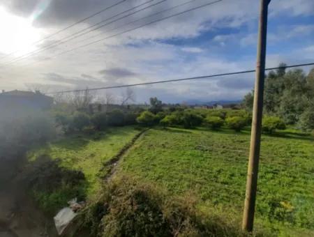 Köyceğiz Toparlar’da Ana Yola Cepheli 2.800 M² Ticari/Konut İmarlı Arsa Satılık