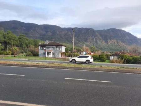 Köyceğiz Toparlar’da Ana Yola Cepheli 2.800 M² Ticari/Konut İmarlı Arsa Satılık