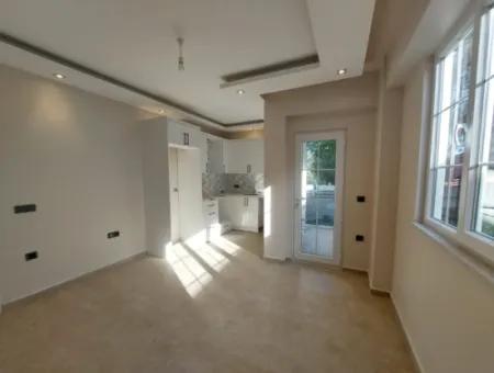 Muğla Ortaca Merkezde Yüzme Havuzlu 1+1 Sıfır Giriş Kat  Daire Kiralık